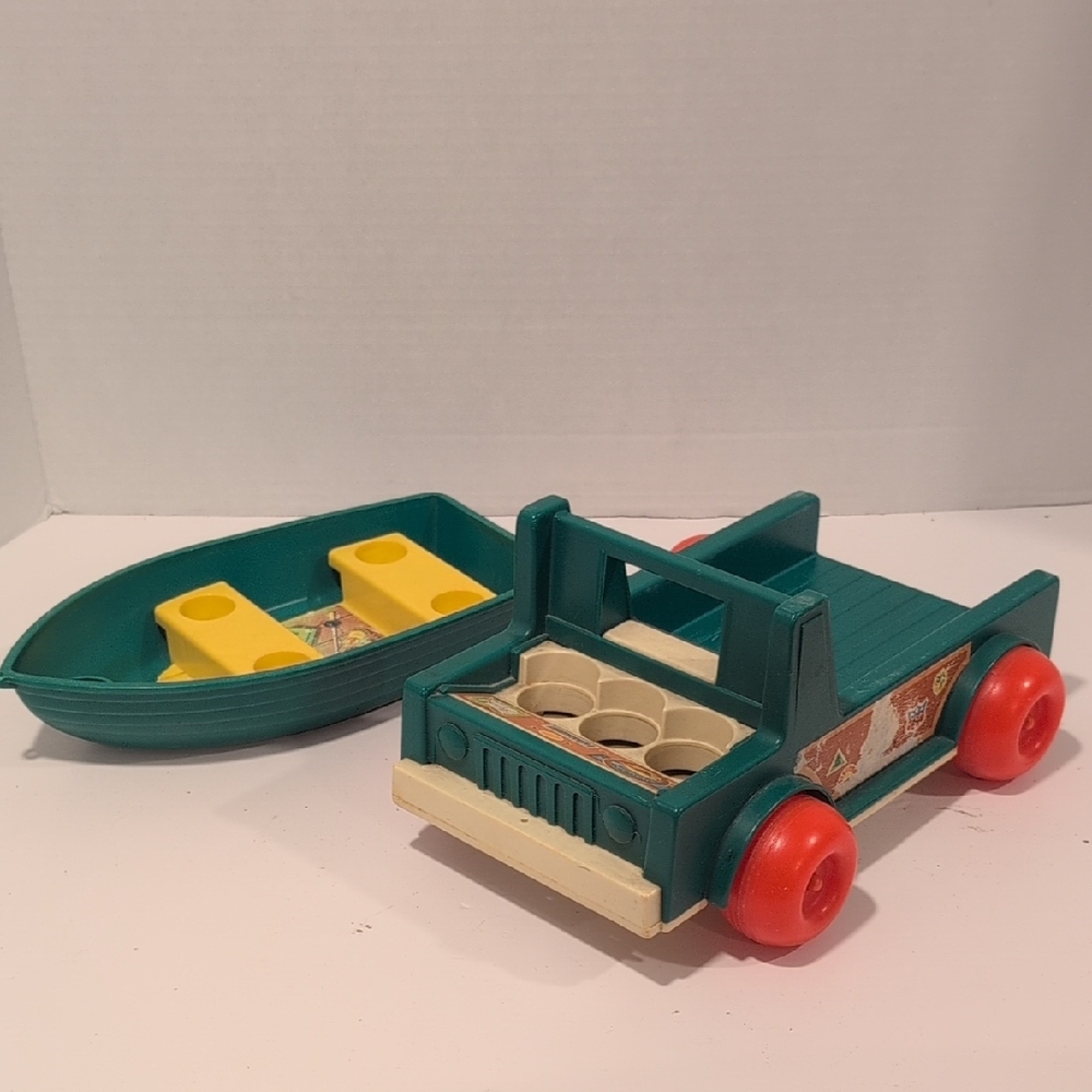 Green and Red Toy Truck with Boat